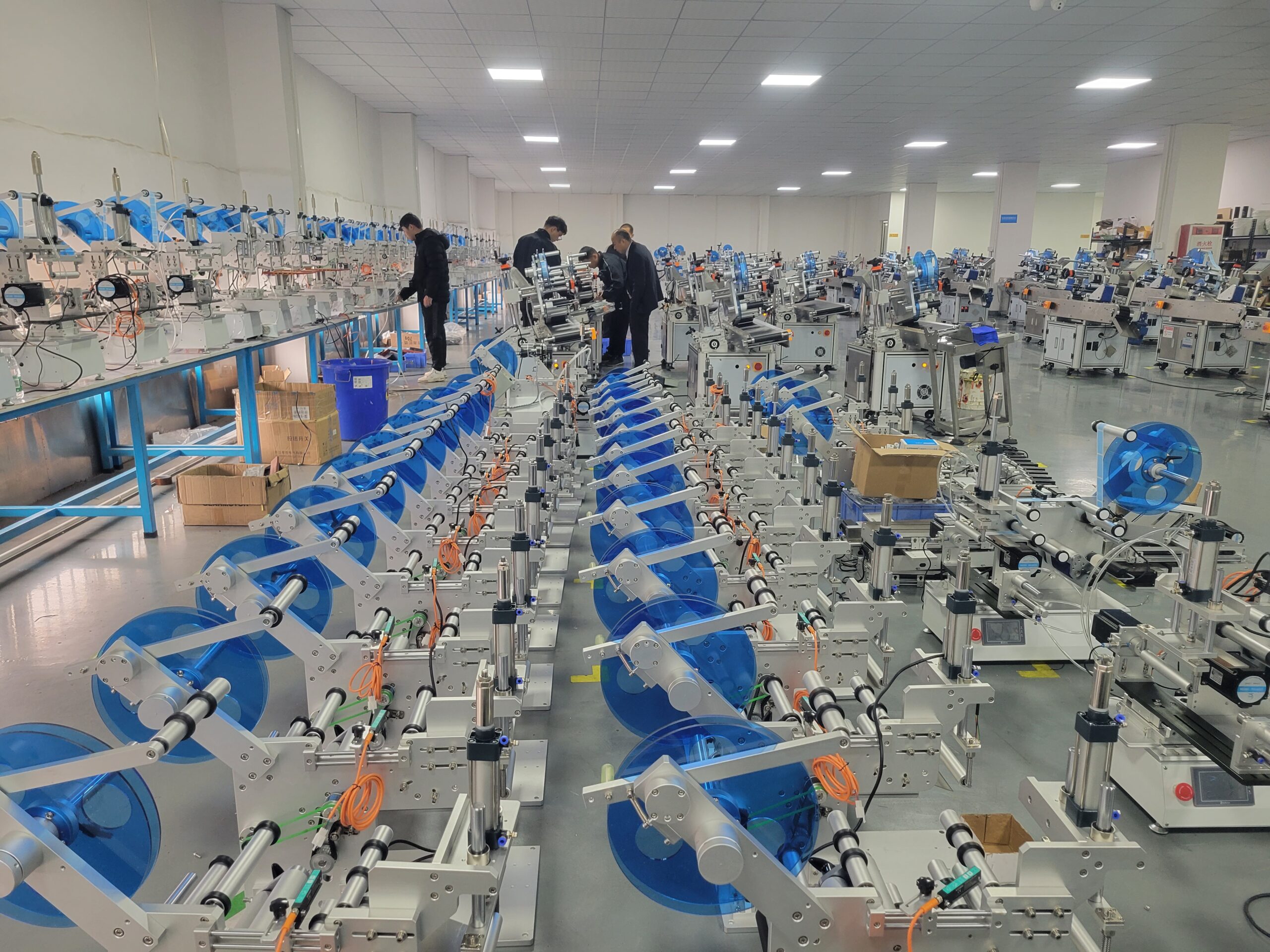 HiPaks showroom with desktop automatic oriented round bottle labelers
