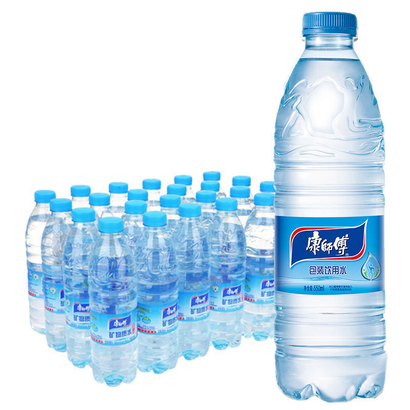 High speed hot melt labeling machine in a beverage factory